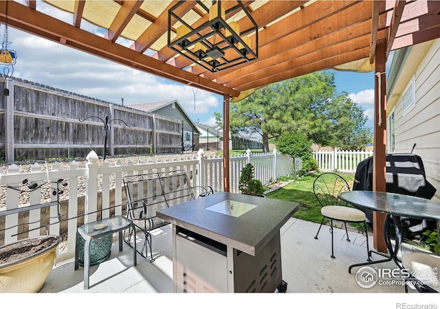 view of patio / terrace featuring outdoor dining area and a fenced backyard