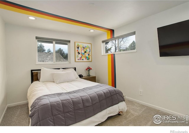 6862 Roaring Fork Trl, Boulder, CO 80301 - carpeted bedroom with baseboards, multiple windows, and recessed lighting