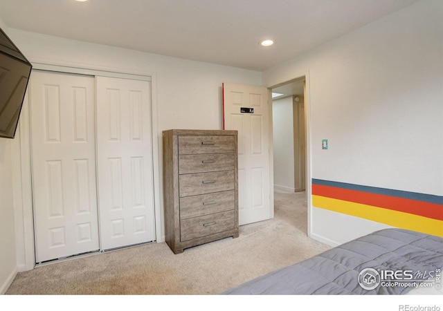 6862 Roaring Fork Trl, Boulder, CO 80301 - bedroom with carpet floors, recessed lighting, a closet, and baseboards