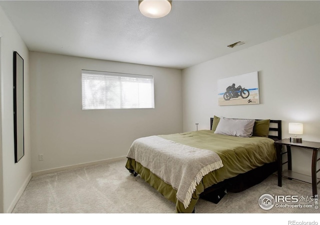 6862 Roaring Fork Trl, Boulder, CO 80301 - carpeted bedroom featuring baseboards