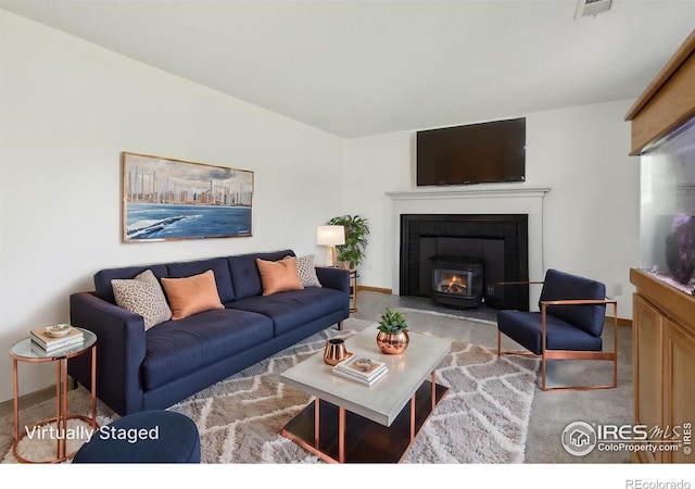 710 Sedge Way, Lafayette, CO 80026 - living room featuring a glass covered fireplace and baseboards