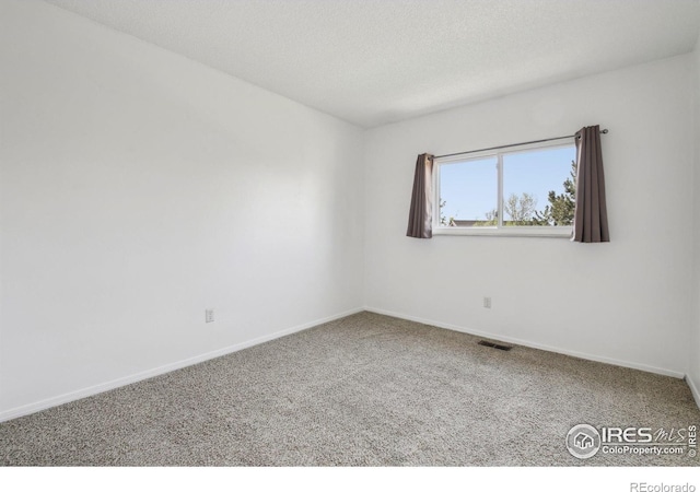 710 Sedge Way, Lafayette, CO 80026 - unfurnished room featuring carpet flooring and a textured ceiling