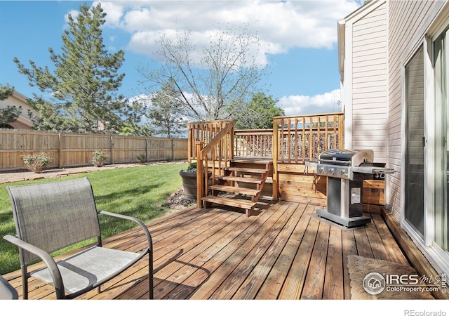 710 Sedge Way, Lafayette, CO 80026 - wooden deck with area for grilling and a fenced backyard