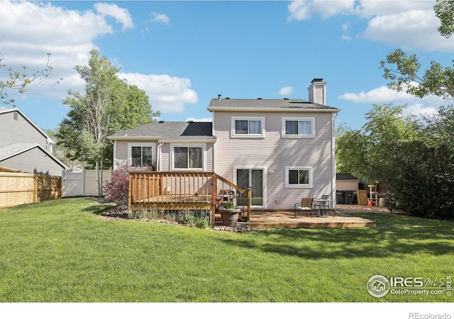 710 Sedge Way, Lafayette, CO 80026 - back of house featuring a wooden deck and a chimney