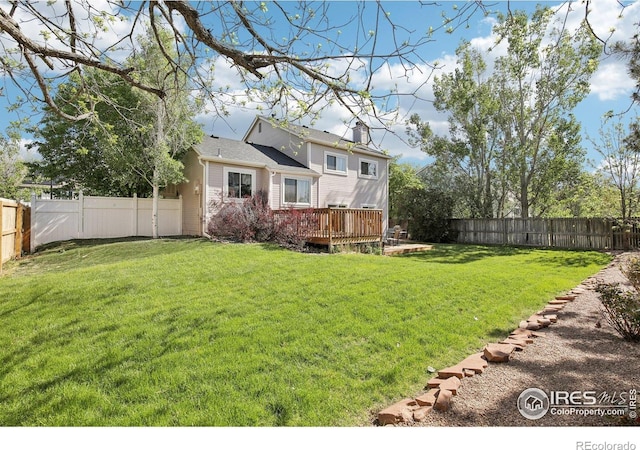 710 Sedge Way, Lafayette, CO 80026 - fenced backyard with a wooden deck
