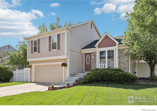 710 Sedge Way, Lafayette, CO 80026 - view of front facade featuring concrete driveway and a garage