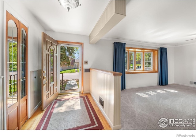 foyer entrance with baseboards