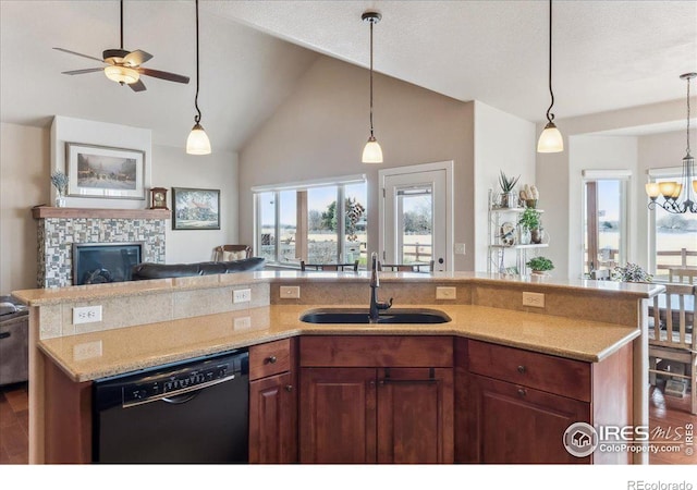 109 Veronica Dr, Windsor, CO 80550 - kitchen featuring black dishwasher, open floor plan, a sink, plenty of natural light, and high vaulted ceiling