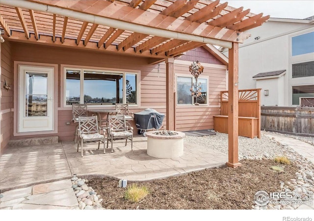 109 Veronica Dr, Windsor, CO 80550 - view of patio / terrace with fence, an outdoor fire pit, area for grilling, and a pergola