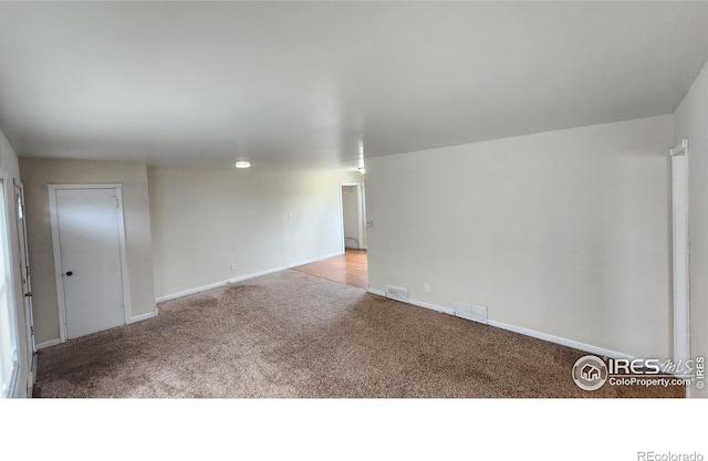 214 Charmony Pl, Sterling, CO 80751 - carpeted spare room featuring baseboards