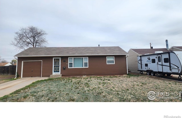 214 Charmony Pl, Sterling, CO 80751 - single story home featuring a garage and driveway