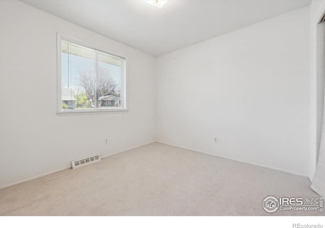 200 Perry St, Denver, CO 80219 - carpeted spare room with baseboards