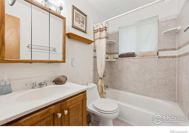 200 Perry St, Denver, CO 80219 - bathroom with toilet, shower / bath combination with curtain, and vanity