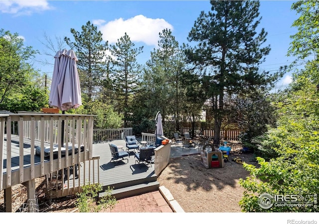 2702 W 23rd St, Greeley, CO 80634 - view of patio / terrace with a deck, fence, and outdoor lounge area