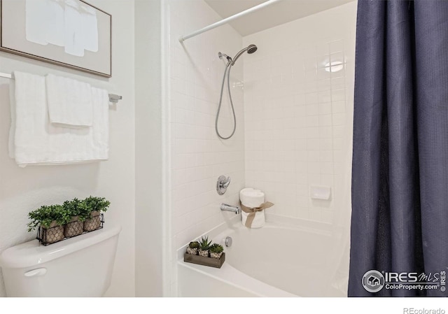 full bath featuring toilet and shower / tub combo