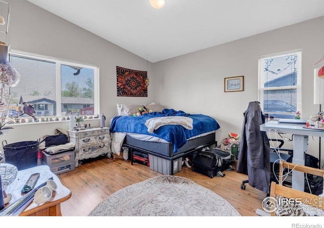 3100 Denton Ave, Boulder, CO 80303 - bedroom with vaulted ceiling and wood finished floors