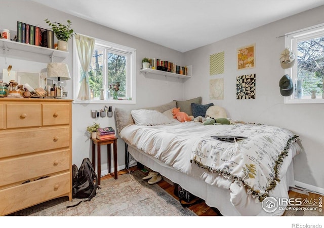 3100 Denton Ave, Boulder, CO 80303 - bedroom featuring light wood finished floors and baseboards