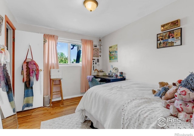 3100 Denton Ave, Boulder, CO 80303 - bedroom with wood finished floors and baseboards