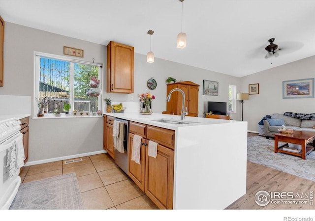 3100 Denton Ave, Boulder, CO 80303 - kitchen featuring a sink, dishwasher, open floor plan, a peninsula, and light countertops
