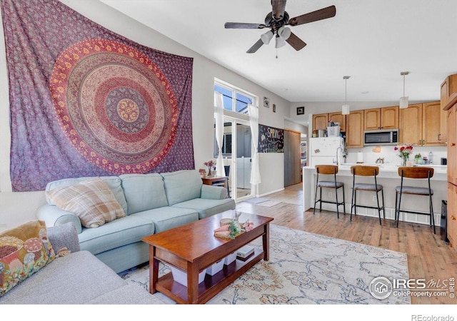 3100 Denton Ave, Boulder, CO 80303 - living area featuring light wood-style floors and ceiling fan