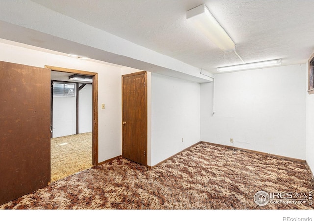 1207 S Tyler Ave, Loveland, CO 80537 - finished basement with carpet and a textured ceiling
