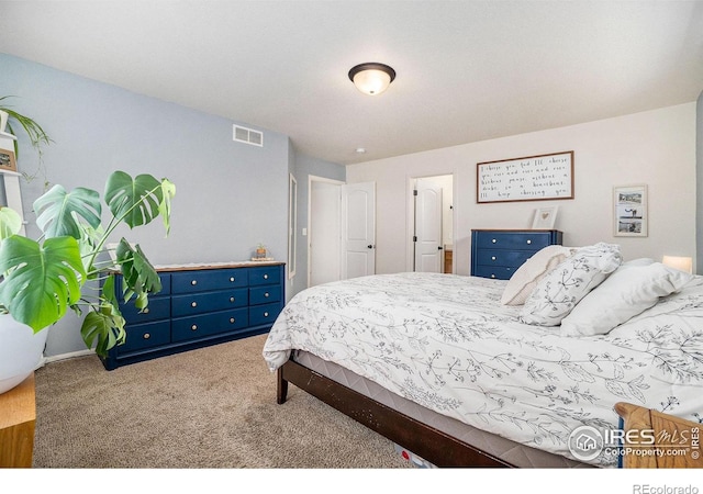 carpeted bedroom with baseboards