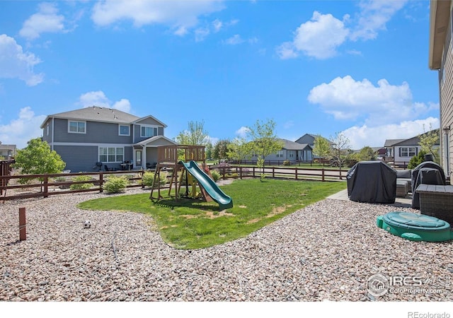 view of jungle gym with a residential view