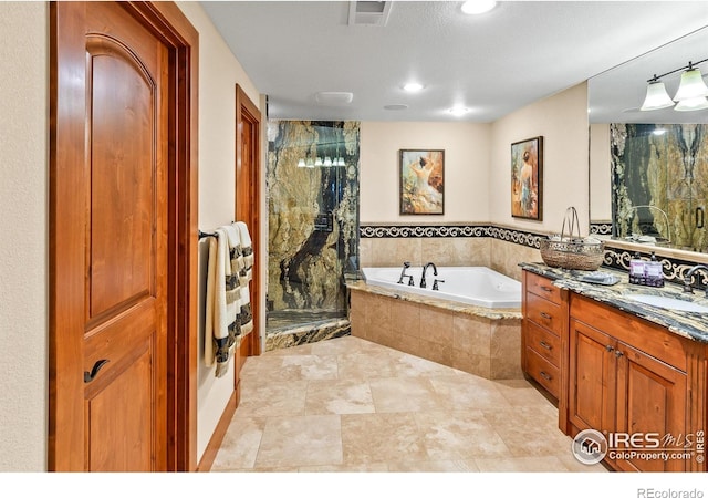 1030 Harbor Walk Ct, Fort Collins, CO 80525 - bathroom with a shower stall, a garden tub, vanity, and recessed lighting