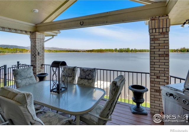 1030 Harbor Walk Ct, Fort Collins, CO 80525 - balcony featuring a water view and outdoor dining area