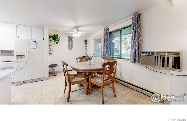 925 Columbia Rd Unit 614, Fort Collins, CO 80525 - dining room with a baseboard heating unit, a ceiling fan, light tile patterned floors, and baseboards