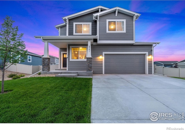 3751 Beech Tree St, Wellington, CO 80549 - view of front of property with a garage, a porch, and concrete driveway