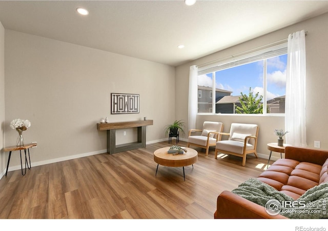 3751 Beech Tree St, Wellington, CO 80549 - living room with wood finished floors, recessed lighting, and baseboards