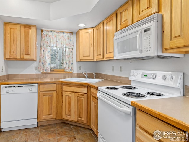 865 Crabapple Ln, Estes Park, CO 80517 - kitchen featuring white appliances, a sink, light countertops, and light stone finish flooring