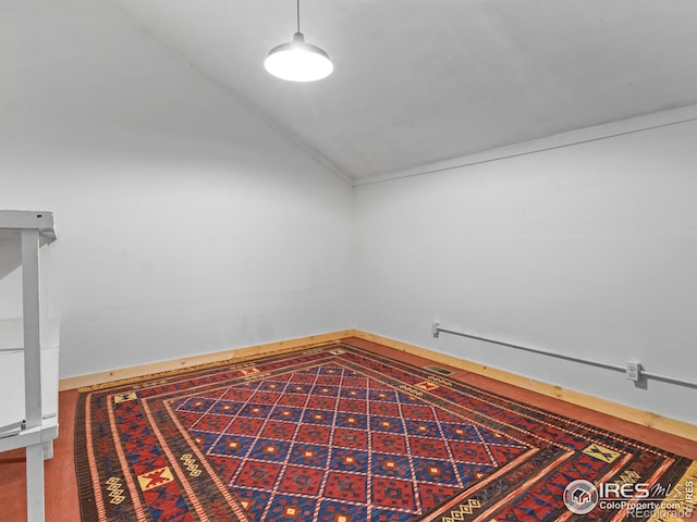 865 Crabapple Ln, Estes Park, CO 80517 - spare room with lofted ceiling and baseboards