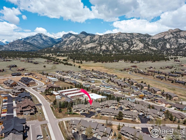 865 Crabapple Ln, Estes Park, CO 80517 - aerial view of property's location featuring a mountainous background and nearby suburban area