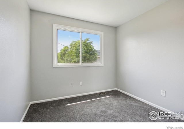 2136 3rd St SW Unit 3, Loveland, CO 80537 - carpeted spare room featuring baseboards