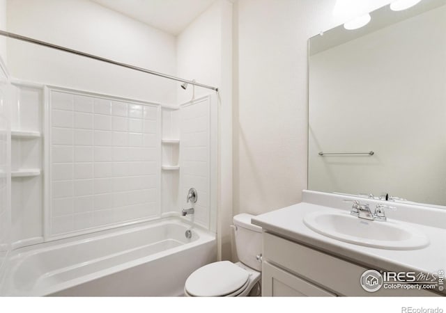 full bath featuring vanity, toilet, and shower / bathtub combination