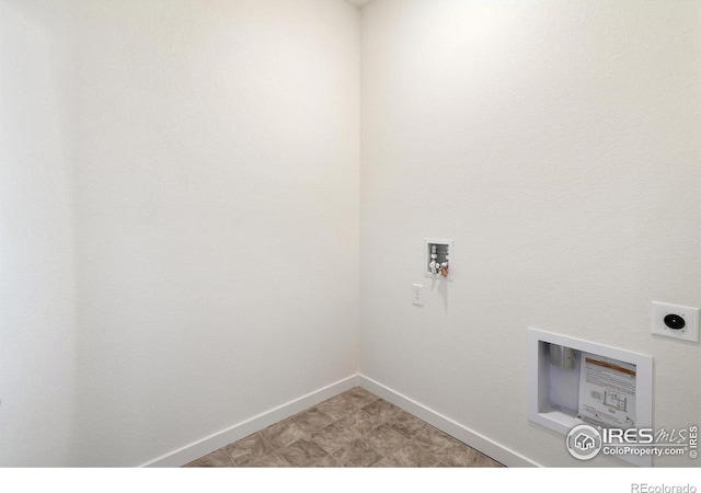 laundry room featuring hookup for an electric dryer, washer hookup, and baseboards