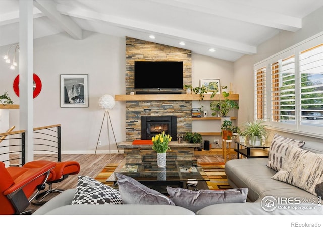 2001 James Dr, Loveland, CO 80538 - living area featuring wood finished floors, a fireplace, baseboards, and recessed lighting