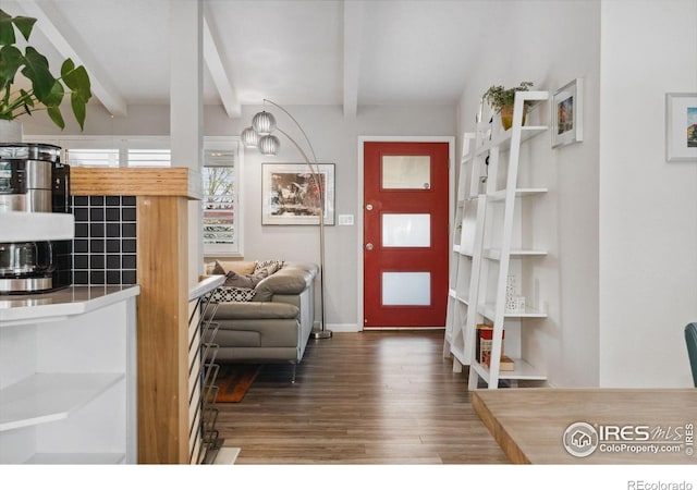 2001 James Dr, Loveland, CO 80538 - foyer with beamed ceiling, wood finished floors, and baseboards