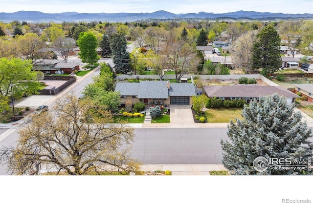 2001 James Dr, Loveland, CO 80538 - aerial view of residential area with a mountainous background