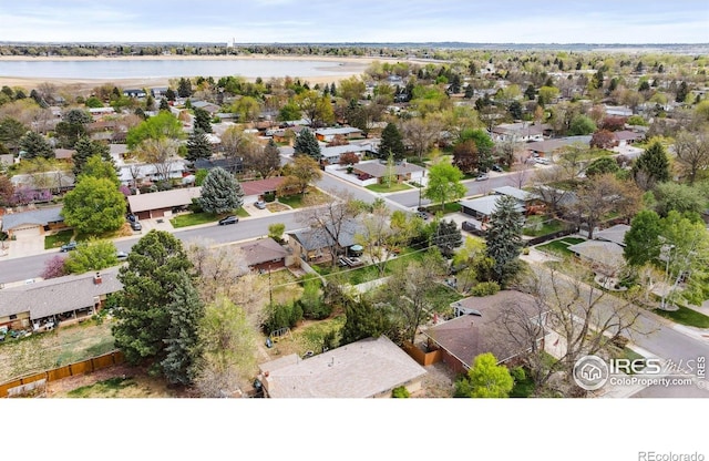 2001 James Dr, Loveland, CO 80538 - aerial perspective of suburban area featuring a large body of water