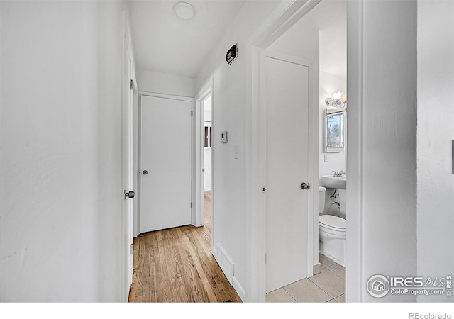 hall with light wood finished floors