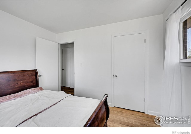 bedroom featuring light wood finished floors