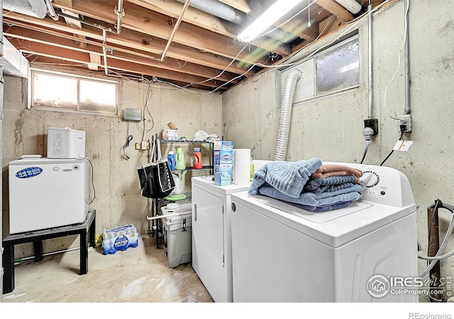 laundry room featuring washer and clothes dryer