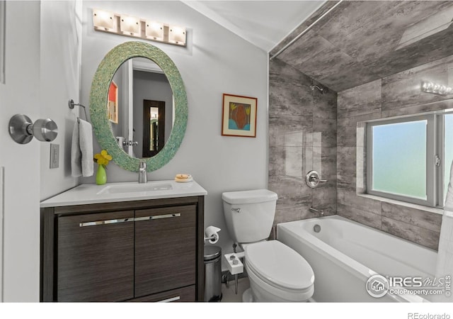 full bathroom featuring lofted ceiling, toilet, vanity, and bathing tub / shower combination