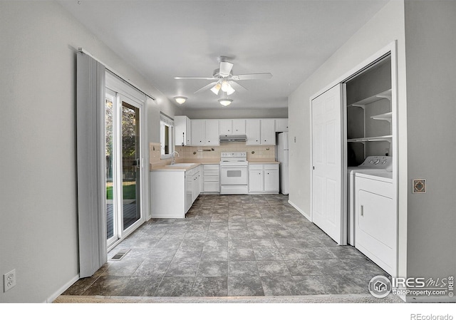 1201 Stein St, Lafayette, CO 80026 - kitchen with white appliances, washer / dryer, under cabinet range hood, ceiling fan, and light countertops