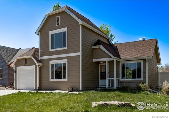 traditional-style home featuring a garage, a front lawn, concrete driveway, and a shingled roof