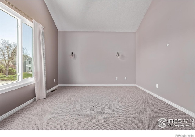 bonus room with carpet flooring, baseboards, and lofted ceiling