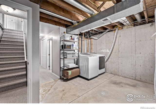 unfinished below grade area with independent washer and dryer and stairway